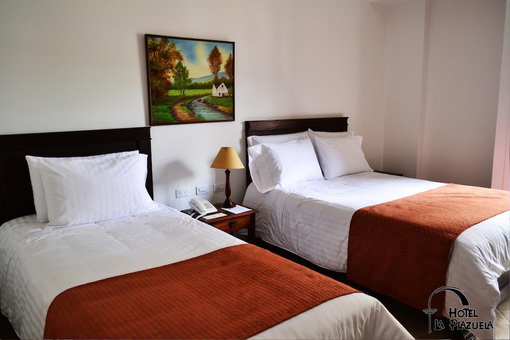 Hotel La Plazuela Попаян Номер фото